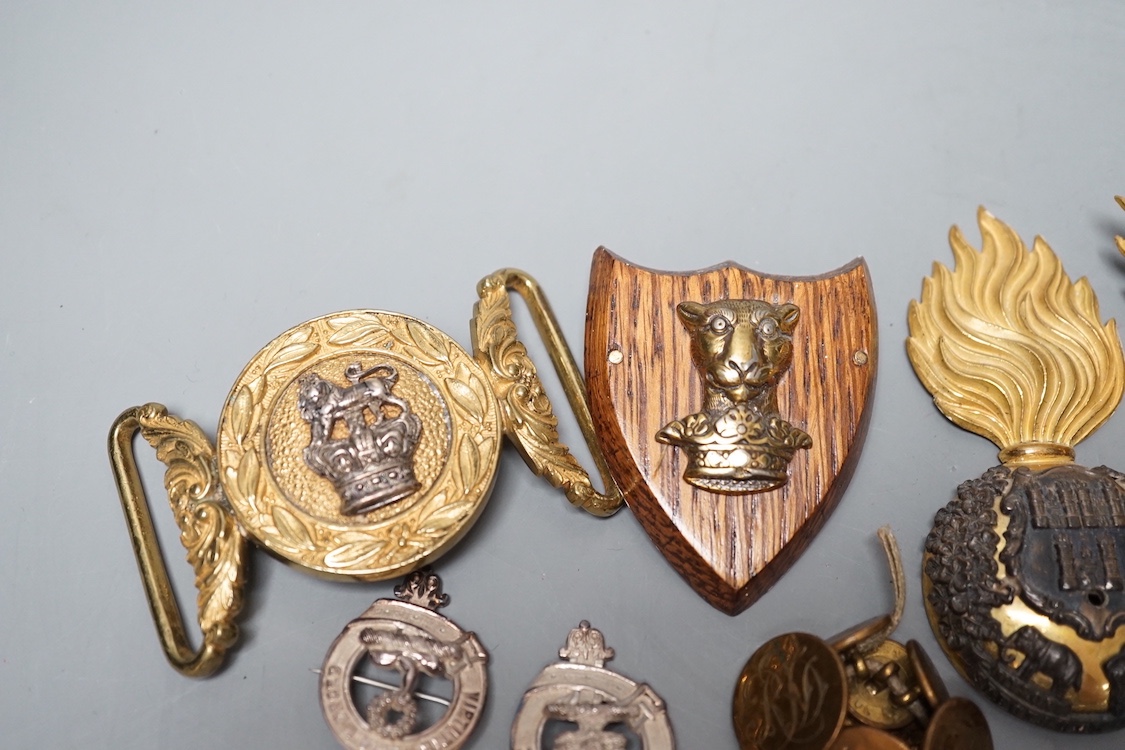 British and Irish regimental badges etc. including two Royal Munster Fusiliers badges, a Royal Dublin Fusiliers belt plaque etc